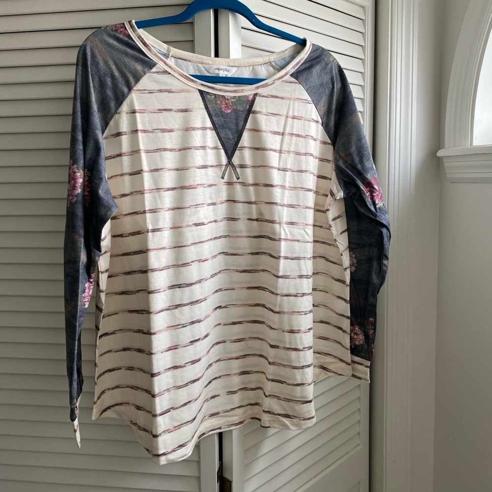 Brand new long sleeve with camouflage floral print sleeve.
